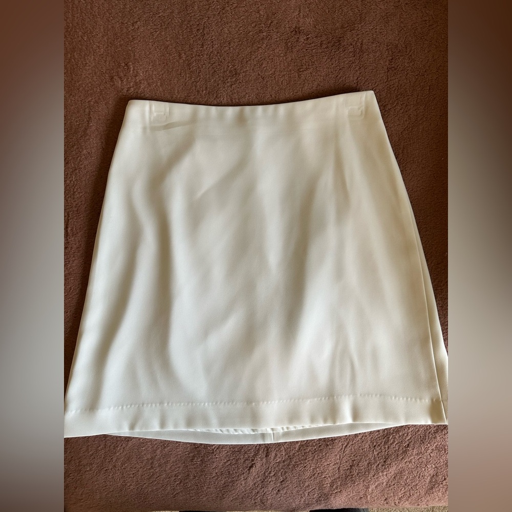 Bebe white miniskirt, size 6
